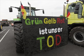 Tractor with sign, Green Yellow Red is our death, farmer protests, demonstration against the policy