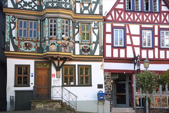 Entrance to the Killingerhaus with oriel and decorations, post letterbox, half-timbered house, arts