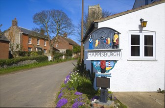 Village sign and houses, Happisburgh, Norfolk, England, United Kingdom, Europe