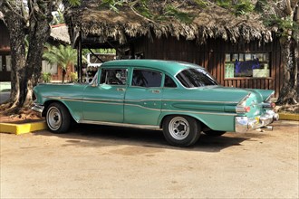 Vintage car from the 1950s, Vinales, Valle de Vinales, Pinar del Rio province, Cuba, Greater