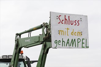 Tractor with a sign, Stop the banging, Farmers' protests, Demonstration against the policies of the