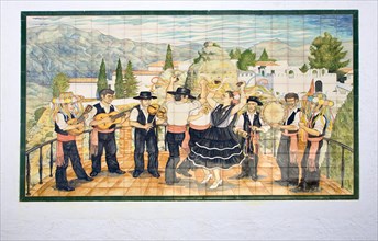 Ceramic tiles picture folk dancers musicians Comares village, Axarquia region, Malaga province,