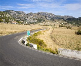 Corner of quiet rural road in Sierra de Grazalema natural park, Cadiz province, Spain, Europe