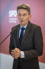 Rolf Muetzenich, SPD parliamentary group leader, during a press statement in front of a