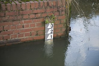 River depth measuring marker scale on the River Deben, Campsea Ashe, Suffolk, England, United