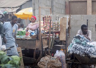 Woman at a market stall in Jos, 06/02/2024
