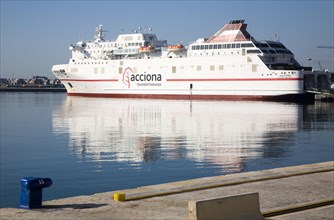 Juan J Sister Acciona Trasmediterranea shipping line Ro-Ro ferry ship moored in the port at Malaga,