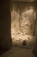 Stone age burial reconstruction in dolmen tomb in the municipal city museum, Ronda, Spain, Europe