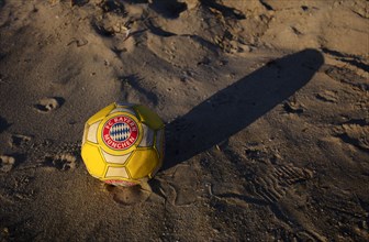 Capped football, leather ball, FC Bayern Munich logo, FCB, air is out, symbolic image, symbolic,