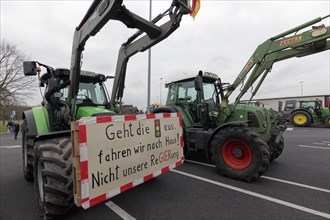Tractor with sign, Not our government, Farmer protests, Demonstration against policies of the