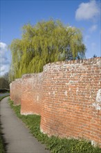 Red brick crinkle crankle or serpentine wall at Easton, Suffolk, England, United Kingdom, Europe