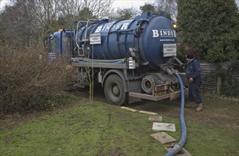 Emptying domestic septic tank