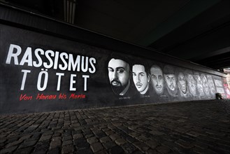 A 27-metre-long memorial graffito under the Friedensbruecke bridge in Frankfurt commemorates the