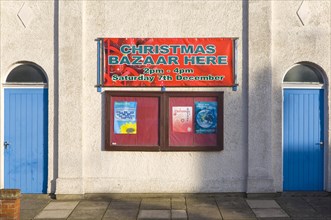 Christmas Bazaar event notice on church hall at Walton, Felixstowe, Suffolk, England, United