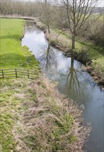 Straight stretch of mature River Deben in its flood plain, Wickham Market, Suffolk, England, United
