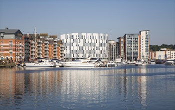Modern university building at centre of waterfront urban redevelopment, Wet Dock, Ipswich, Suffolk,