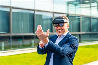 Happy adult caucasian businessman smiling while wearing mixed reality glasses outside a financial