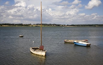 Boat for sale at moorings on the River Stour estuary at Mistley Walls, Mistley, Essex, England,