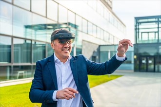 Businessman in a futuristic experience with mixed reality glasses outside a financial building