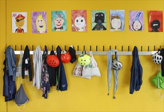 Jackets and bags hanging at a cloakroom in a Berlin primary school, 14/08/2019