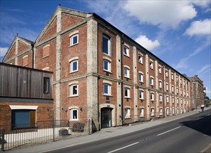 Old industrial maltings building converted into housing at Mistley, Essex, England, United Kingdom,