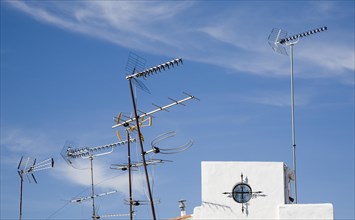 Confused mrs of TV aerials on rooftop in Ronda, Spain, Europe