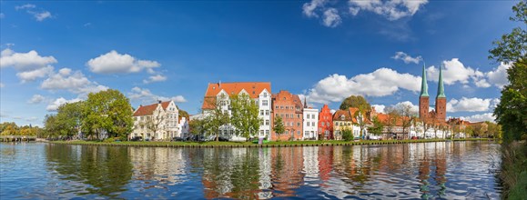 Historic houses and Luebeck Cathedral, Dom zu Luebeck, Luebecker Dom along the river Trave in the
