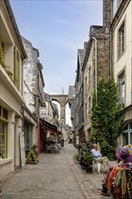 Alley in the old town of Morlaix, in the background the railway viaduct, Morlaix, Departements