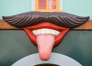 Giant mouth with moustache lips teeth and tongue sticking out, Pleasure Beach funfair, Great