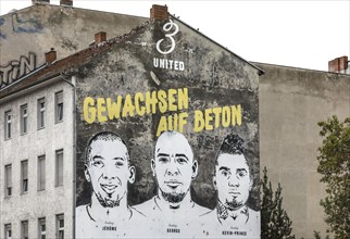 A picture of the brothers Jerome Boateng, George Boateng and Kevin-Prince Boateng can be seen on a