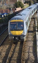 Class 170 turbostar diesel train on rail tracks, Woodbridge, Suffolk, England, United Kingdom,