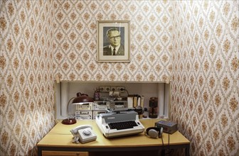 Stasi study with picture of Erich Honecker in the DDR Museum. The DDR Museum shows the life and