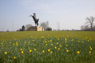 The Newmarket stallion sculpture by Marcia Astor and Allan Sly 2000 near the National Stud,