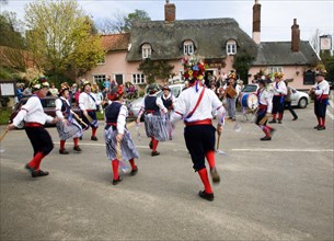Traditional Morris Men doing country dancing in the village of Shottisham, Suffolk, England, United