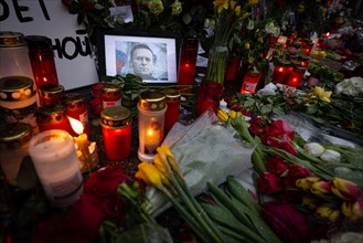 Photos, candles, grave lights and flowers for the Russian opposition leader Alexei Navalny, who