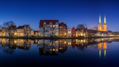 Historic houses and Luebeck Cathedral, Dom zu Luebeck, Luebecker Dom along the river Trave at the