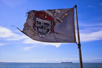 Pirate flag, advertising for tourist ship, excursion boat, pirate ship Arabella, Thessaloniki