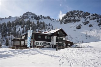 Bodenschneidhaus in winter, mountain hut of the Bodenschneid section of the German Alpine Club,