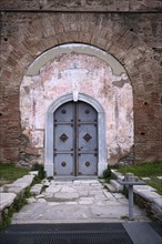 Exterior view of Rotonda, Rotunda of Galerius, Roman round temple, model in front of entrance door,