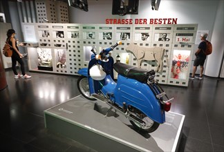 A Simson moped in the DDR Museum. The DDR Museum shows the life and everyday culture of the GDR in