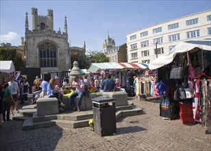 People in historic market place in the city centre of Cambridge, England, United Kingdom, Europe
