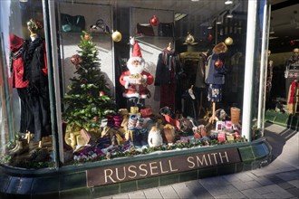 Father Christmas window display Russell Smith shop, Felixstowe, Suffolk, England, United Kingdom,