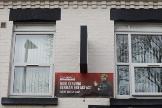 A hotel in the immediate vicinity of Liverpool FC's football stadium advertises with a picture of