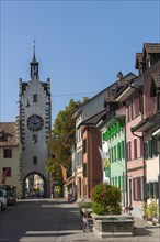 Old town of Dissenhofen am Rhein, town gate, tower clock, floral decoration, district Frauenfeld,