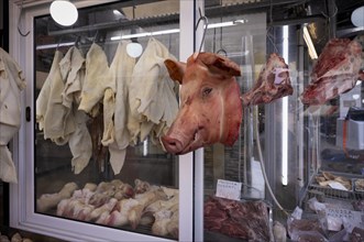 Display of fresh meat, butcher's shop, pig's head, food, Kapani market, Vlali, Thessaloniki,