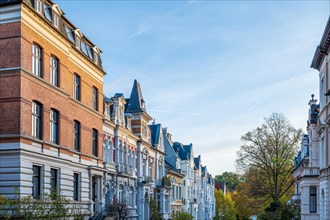 Terraced houses with historic architecture on a sunny autumn day, Wilhelminian style, Briller