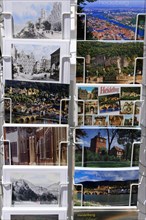 Postcard stand with various postcards of Heidelberg, Heidelberg, Baden-Wuerttemberg, Germany,