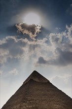 Pyramid of Giza in dramatic sunlight, cloud, sky, gloomy, dramatic, sunbeam, desert, wonder of the