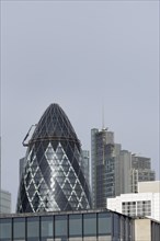 The Gherkin skyscraper building and nearby high rise office building, City of London, England,