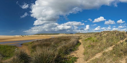 Idyllic coastal landscape in the Algarve, weather, blue sky, dune, beach, beach holiday, natural